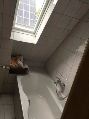 Ein Badezimmer in der Unterkunft Augsburg-Bergheim E.