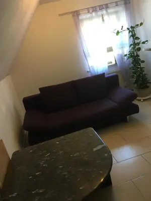 Ein Sitzbereich in der Unterkunft Augsburg-Bergheim E.