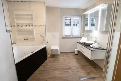 Ein Badezimmer in der Unterkunft Ferienwohnungen 