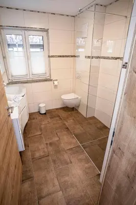 Ein Badezimmer in der Unterkunft Ferienwohnungen 
