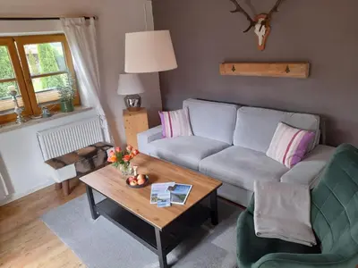 Ein Sitzbereich in der Unterkunft Ferienwohnung Heimat | Chiemgau Karte
