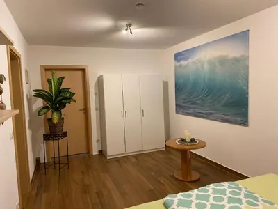 Ein Bett oder Betten in einem Zimmer der Unterkunft Anton‘s Souterrain-Wohnung