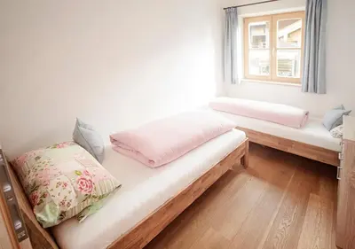 Ein Bett oder Betten in einem Zimmer der Unterkunft Ferienwohnung Glaserhäusl Seeblick