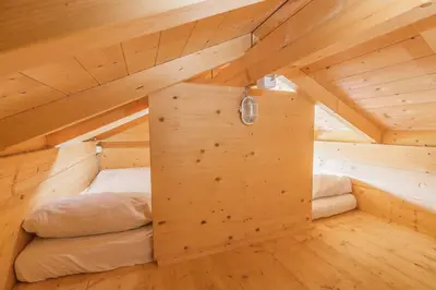 Ein Bett oder Betten in einem Zimmer der Unterkunft Almdorado