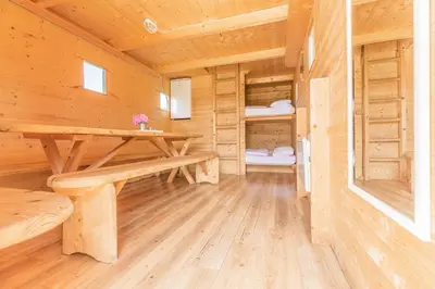 Ein Bett oder Betten in einem Zimmer der Unterkunft Almdorado