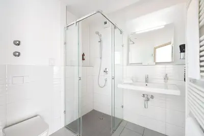 Ein Badezimmer in der Unterkunft Hotel Drei Rosen