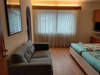 Ein Bett oder Betten in einem Zimmer der Unterkunft Appartementhaus Florianshof