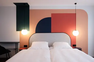Ein Bett oder Betten in einem Zimmer der Unterkunft The Dot | 24/7 Checkin