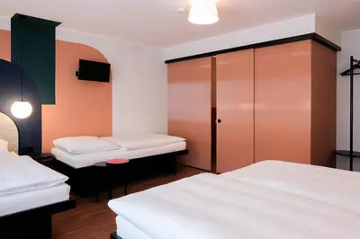 Ein Bett oder Betten in einem Zimmer der Unterkunft The Dot | 24/7 Checkin