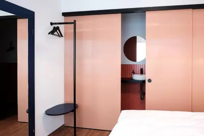 Ein Bett oder Betten in einem Zimmer der Unterkunft The Dot | 24/7 Checkin