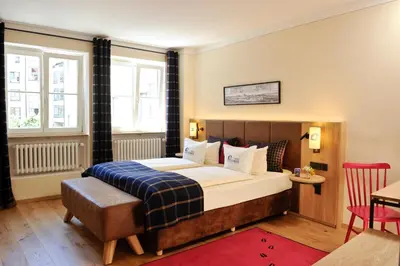 Ein Bett oder Betten in einem Zimmer der Unterkunft Hotel Blauer Bock