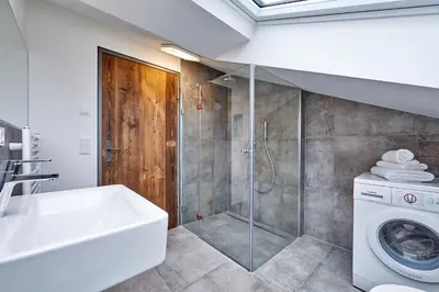 Ein Badezimmer in der Unterkunft City Suites Murnau