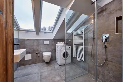 Ein Badezimmer in der Unterkunft City Suites Murnau
