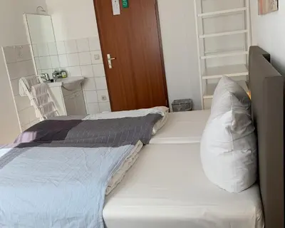 Ein Bett oder Betten in einem Zimmer der Unterkunft Pension Belo Sono