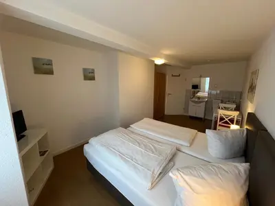 Ein Bett oder Betten in einem Zimmer der Unterkunft Pension Belo Sono