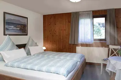 Ein Bett oder Betten in einem Zimmer der Unterkunft Ferienwohnung Irene Dorn // Andechs