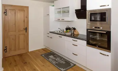 Küche/Küchenzeile in der Unterkunft Chalet Landsberg