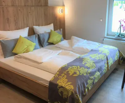 Ein Bett oder Betten in einem Zimmer der Unterkunft Business Boardinghouse Augsburg, zentral, ruhig & mit Parkplatz