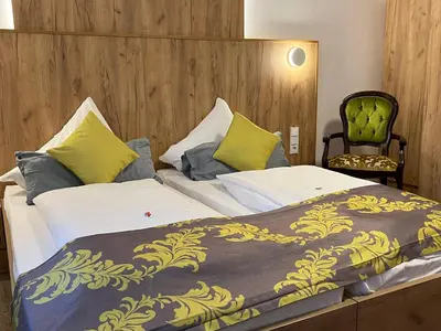Ein Bett oder Betten in einem Zimmer der Unterkunft Business Boardinghouse Augsburg, zentral, ruhig & mit Parkplatz