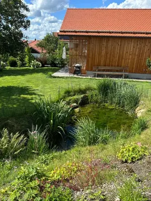 Ein Garten an der Unterkunft Schlossquelle Königsdorf
