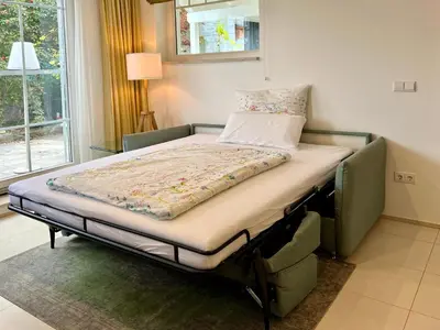 Ein Bett oder Betten in einem Zimmer der Unterkunft Ferienwohnungen Schwarzer in Seehausen am Staffelsee
