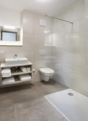 Ein Badezimmer in der Unterkunft Apartment Hotel 37