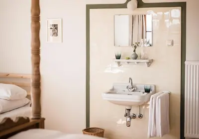 Ein Badezimmer in der Unterkunft Berghotel Altes Wallberghaus
