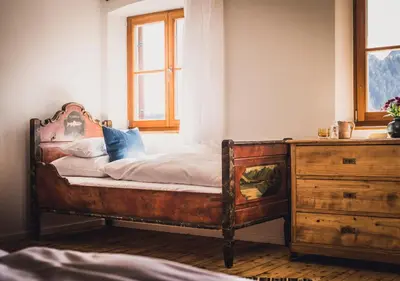 Ein Bett oder Betten in einem Zimmer der Unterkunft Berghotel Altes Wallberghaus