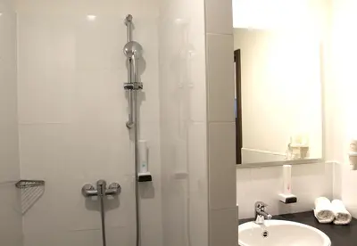 Ein Badezimmer in der Unterkunft Come IN Hotel