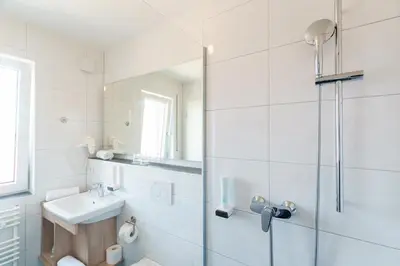 Ein Badezimmer in der Unterkunft Come IN Hotel
