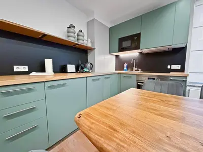 Küche/Küchenzeile in der Unterkunft Flatista Homes - Central Station - 3BR