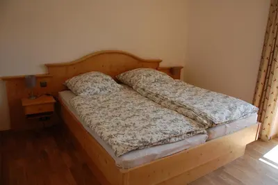 Ein Bett oder Betten in einem Zimmer der Unterkunft Landhaus Fuchs
