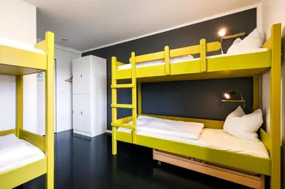 Ein Bett oder Betten in einem Zimmer der Unterkunft Jugendherberge Lenggries