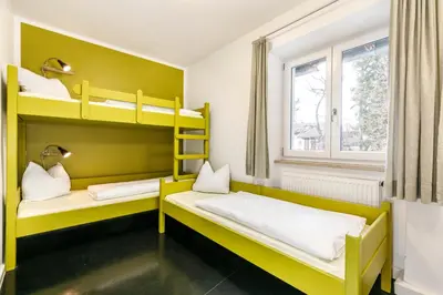 Ein Bett oder Betten in einem Zimmer der Unterkunft Jugendherberge Lenggries