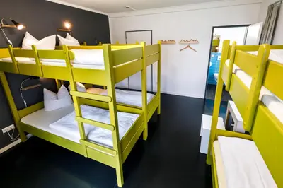 Ein Bett oder Betten in einem Zimmer der Unterkunft Jugendherberge Lenggries
