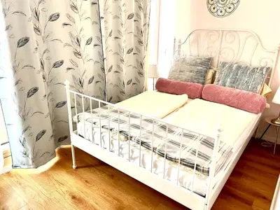 Ein Bett oder Betten in einem Zimmer der Unterkunft Baynunah Suites Aparthotel