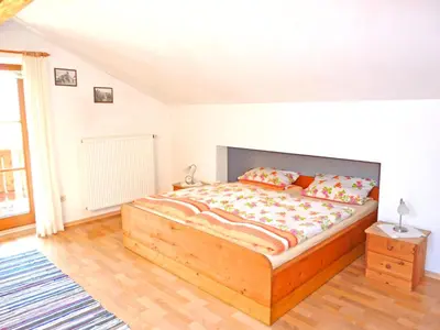 Ein Bett oder Betten in einem Zimmer der Unterkunft Ferienwohnungen Maurer Höhenberg