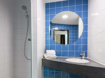 Ein Badezimmer in der Unterkunft B&B Hotel Landshut