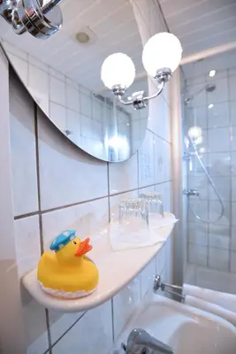 Ein Badezimmer in der Unterkunft Hotel Hecht Garni