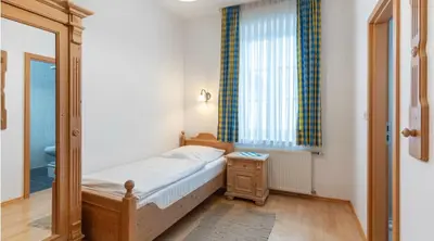 Ein Bett oder Betten in einem Zimmer der Unterkunft Hotel Forchhammer