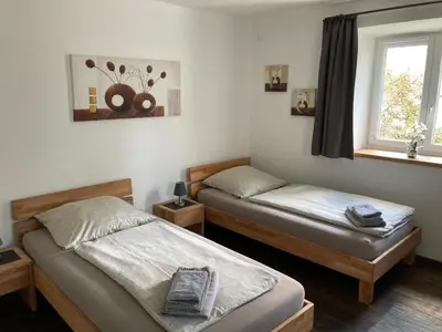 Ein Bett oder Betten in einem Zimmer der Unterkunft Pension Zur Alten Post