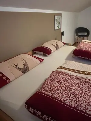 Ein Bett oder Betten in einem Zimmer der Unterkunft Ferienhaus Westerbuchberg