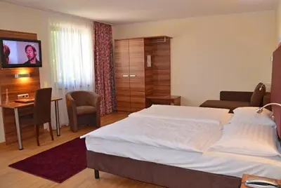 Ein Bett oder Betten in einem Zimmer der Unterkunft Hotel und Cafe Paso