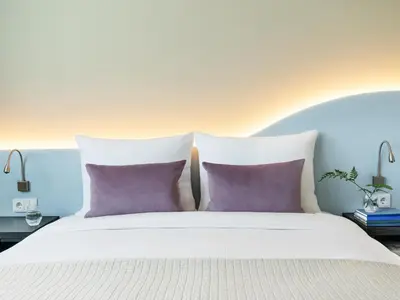 Ein Bett oder Betten in einem Zimmer der Unterkunft Numa Munich Viktoria