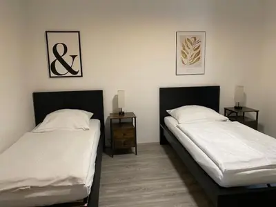 Ein Bett oder Betten in einem Zimmer der Unterkunft Stadtdomizil