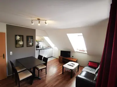 Ein Sitzbereich in der Unterkunft Stadtdomizil
