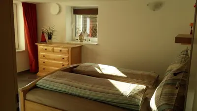Ein Bett oder Betten in einem Zimmer der Unterkunft Ferienwohnung Valentin