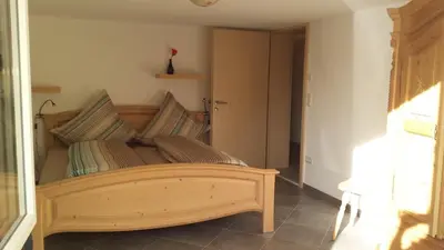 Ein Bett oder Betten in einem Zimmer der Unterkunft Ferienwohnung Valentin