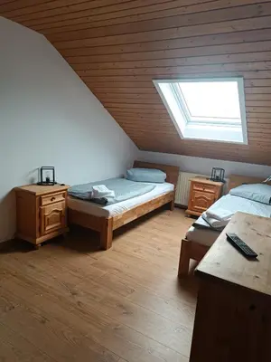 Ein Bett oder Betten in einem Zimmer der Unterkunft Bio Kinder Erlebnis Bauernhof Voit
