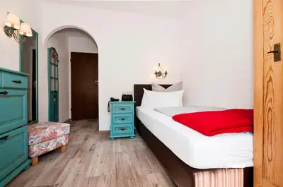 Ein Bett oder Betten in einem Zimmer der Unterkunft Hotel Effland -Sauna -Pool